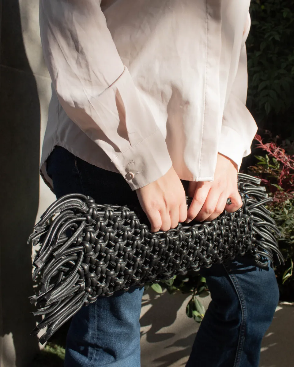 TA-DAAN Weaved leather baguette bag